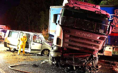 A young couple’s van crashed into a semi-trailer, which had jack-knifed on the Pacific Highway’s Dirty Creek Range. A young couple’s van crashed into a semi-trailer, which had jack-knifed on the Pacific Highway’s Dirty Creek Range.